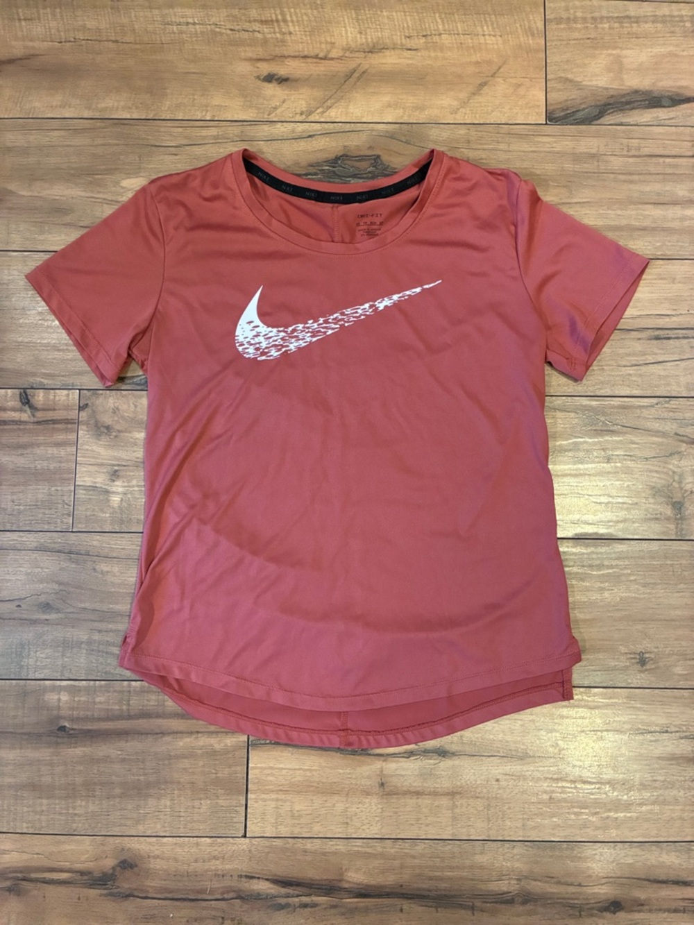 Nike Women’s Rustic Coral Red Short Sleeve Tee with White Swoosh